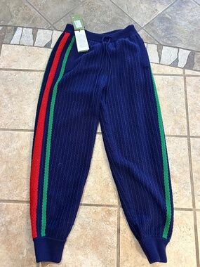 Men’s Gucci web stripe 100% wool track pants. Size L. Made in Italy.